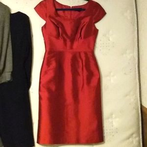 Red sharkskin tahari she stressed